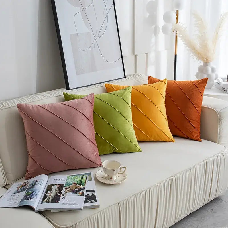 Set of four vibrant velvet throw pillows in dusty rose lime green mustard yellow and burnt orange with hand pleat embroidery