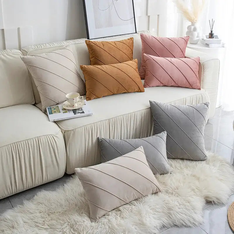 Set of beige and pink velvet throw pillows with hand pleat embroidered diagonal stitching for living room decor