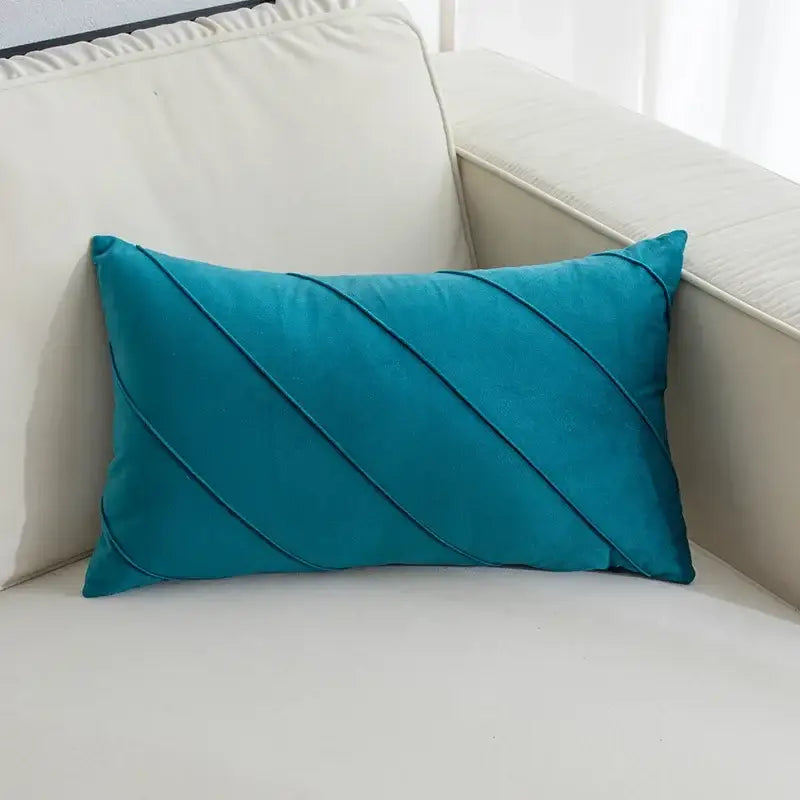 Teal velvet rectangular pillow with diagonal pleats featuring hand pleat embroidered design for living room decor
