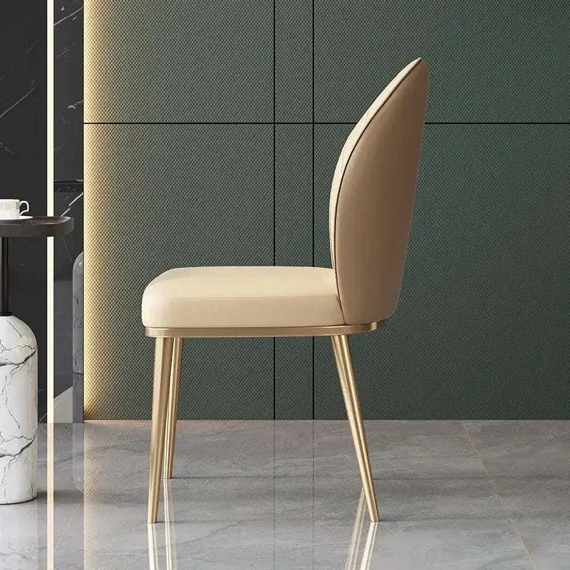 Beige leather dining chair with pleated upholstery and slender gold metal legs from decorbites dining set