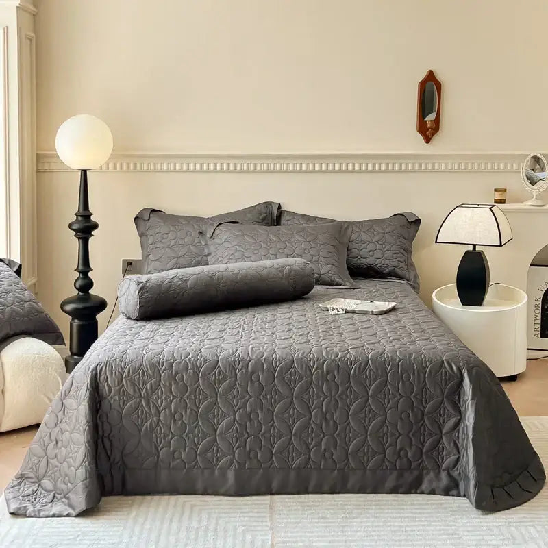 Gray quilted eucalyptus fiber bedspread with subtle floral pattern and ruffled edges for decorbites eucalyptus fiber decor