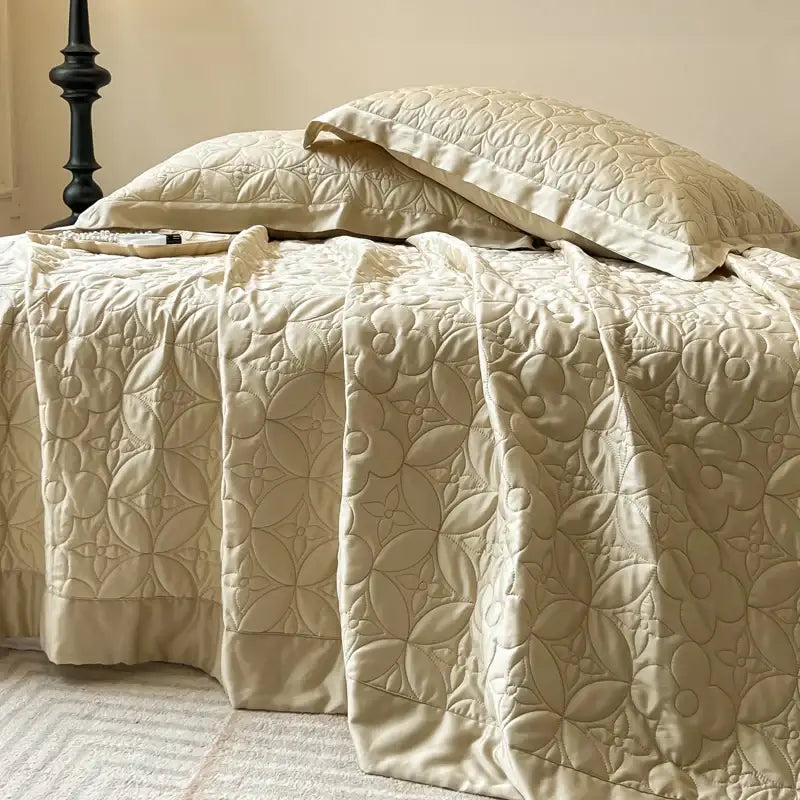 Beige quilted floral eucalyptus fiber bedspread with cream satin embroidery for elegant bedroom decorbites eucalyptus fiber cover