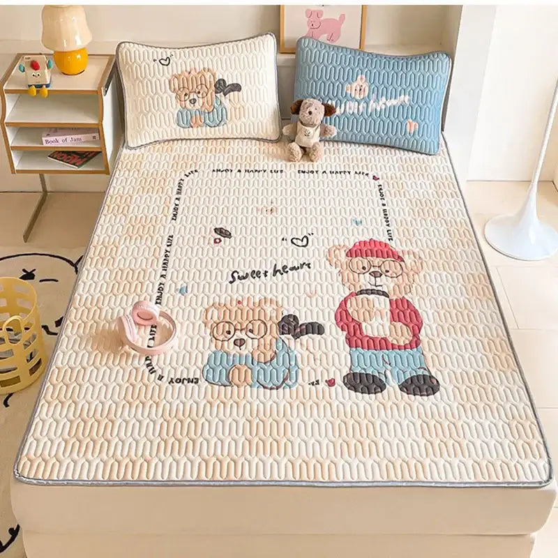 Beige quilted bed pad with decorbites cartoon pattern latex featuring embroidered bears in red and blue outfits with sweet hearts text