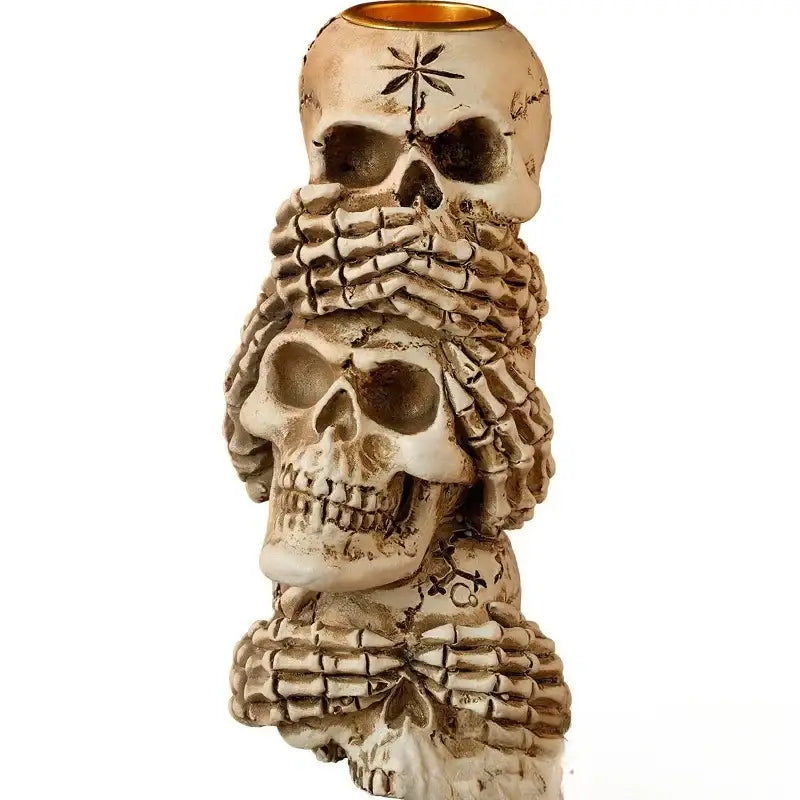 Beige resin bone skeleton candlestick holder with three skulls and skeletal hands decorbites bone skeleton decor