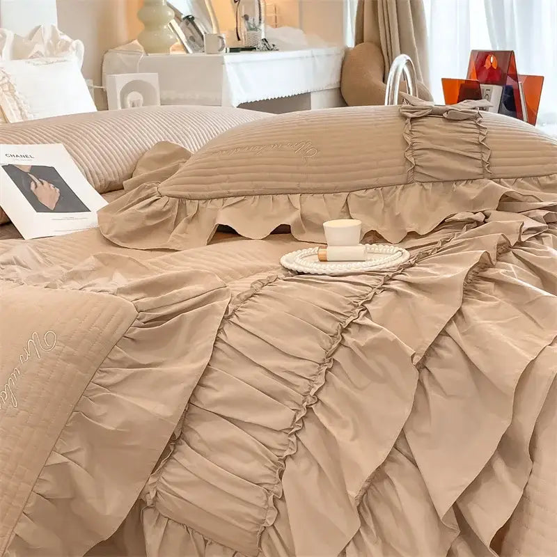 Beige ruffled cake layers cotton duvet set with quilted design and embroidered chanel logo for elegant bedding decorbites cake layers