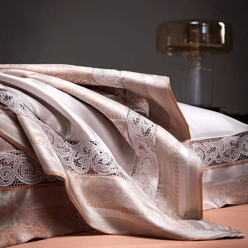 A luxurious cream satin bedspread with lace trim and gold embroidery in beige and silver damask jacquard egyptian cotton bedding set