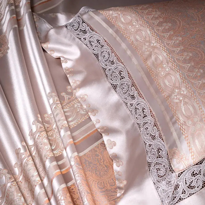 Luxurious beige damask jacquard egyptian cotton bedding set with gold paisley patterns and white lace trim edge