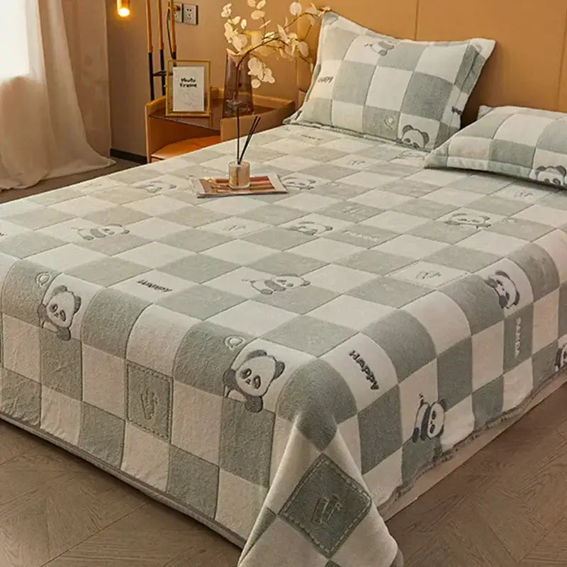 Beige space astronaut cartoon flannel blanket with plush gray and white panda checkered design from decorbites cartoon flannel collection