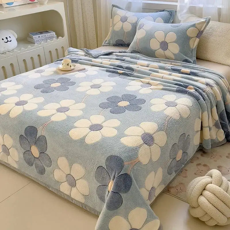 Beige space astronaut cartoon flannel blanket with soft blue floral patterned fleece featuring cream and gray blossoms by decorbites cartoon flannel