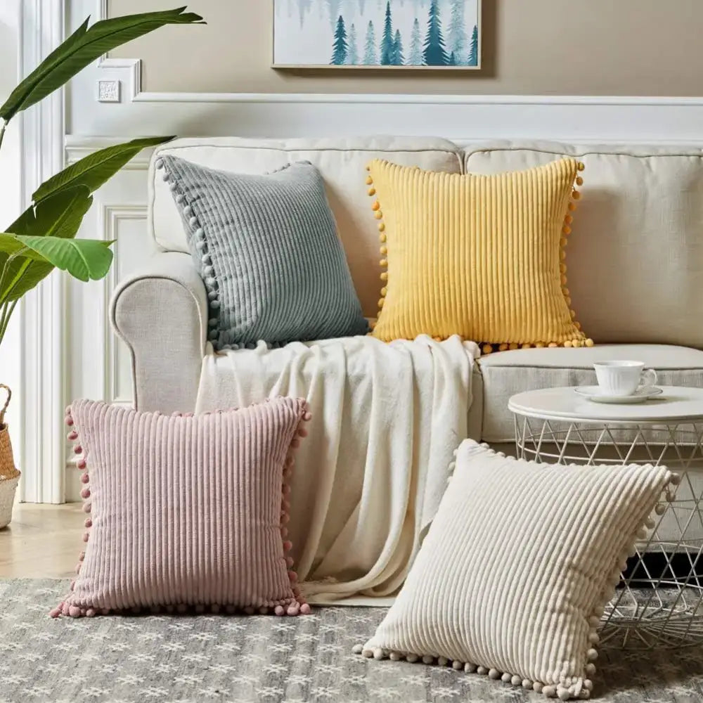 Beige striped corduroy cushion covers with pom pom trim in muted pastel shades for living room decorbites beige striped