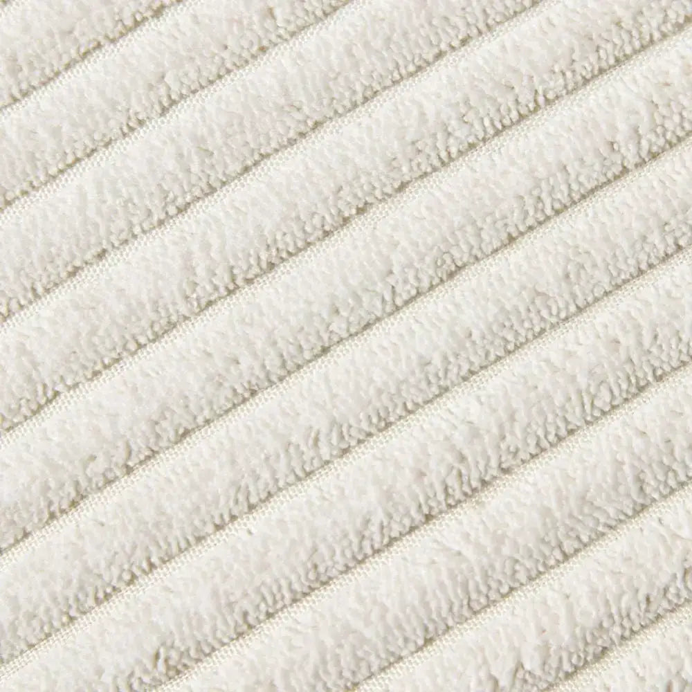 Beige striped corduroy cushion cover with pom pom accents made of cream-colored corduroy fabric for living room decorbites decor