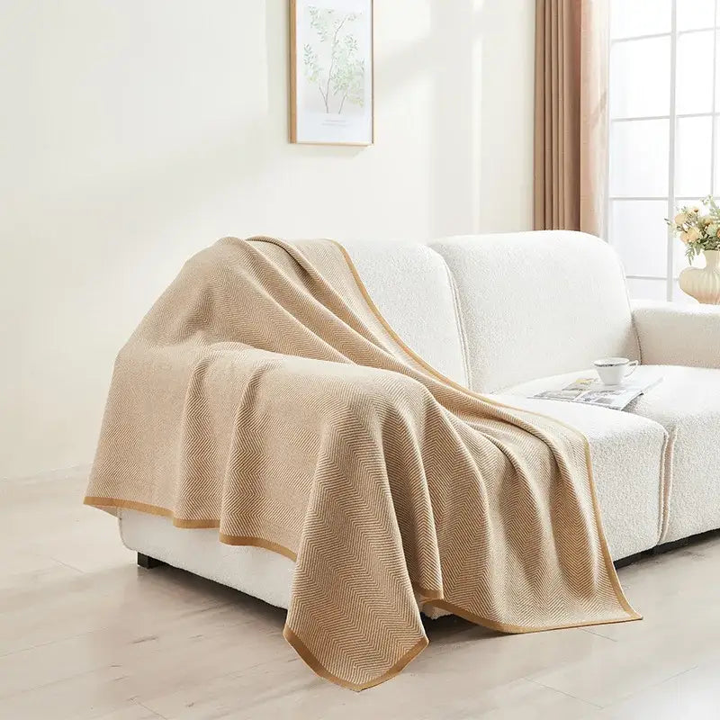 Beige and tan decorbites herringbone knit blanket with subtle textured weave and finished edges for sofa decor