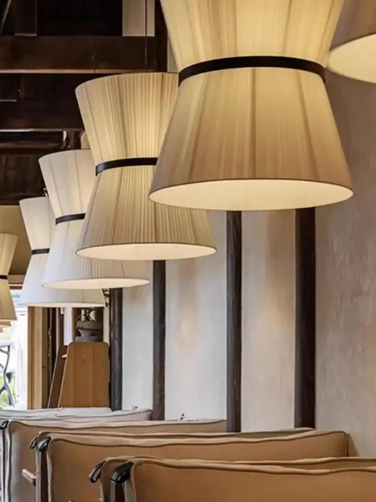 Beige tapered cocoon cloth chandelier kitchen pendant light with pleated lampshades and black bands by decorbites cocoon cloth