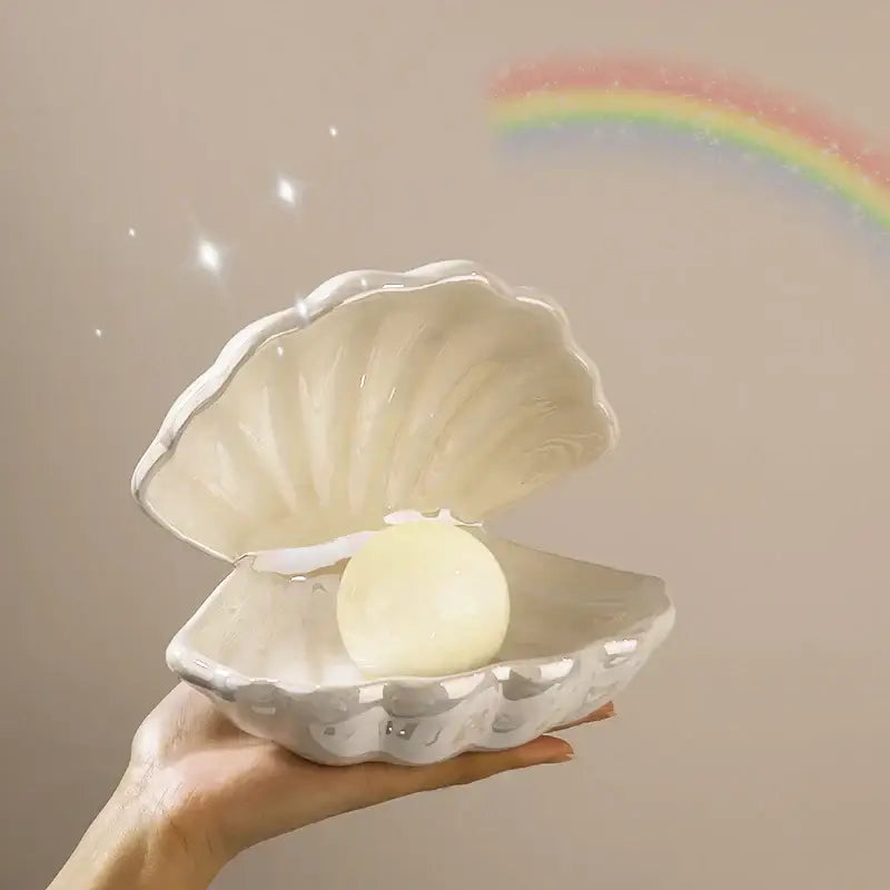 Beige and terracotta decorbites ceramic shell pearl night light with creamy white ceramic clamshell and luminous sphere