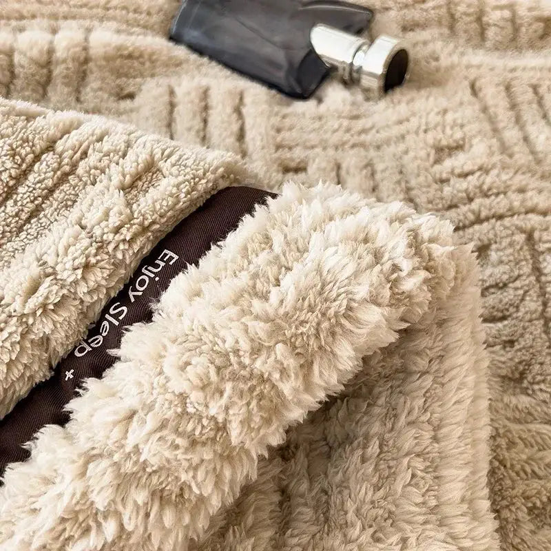 Beige textured cozy fluffy fleece blanket with ribbed plush fabric and dark brown lining reading enjoy sleep decorbites cozy fluffy