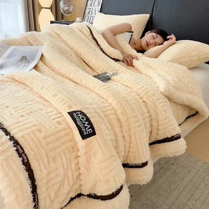 Beige textured cozy fluffy fleece blanket with dark brown trim and homme brand label for decorbites cozy fluffy use