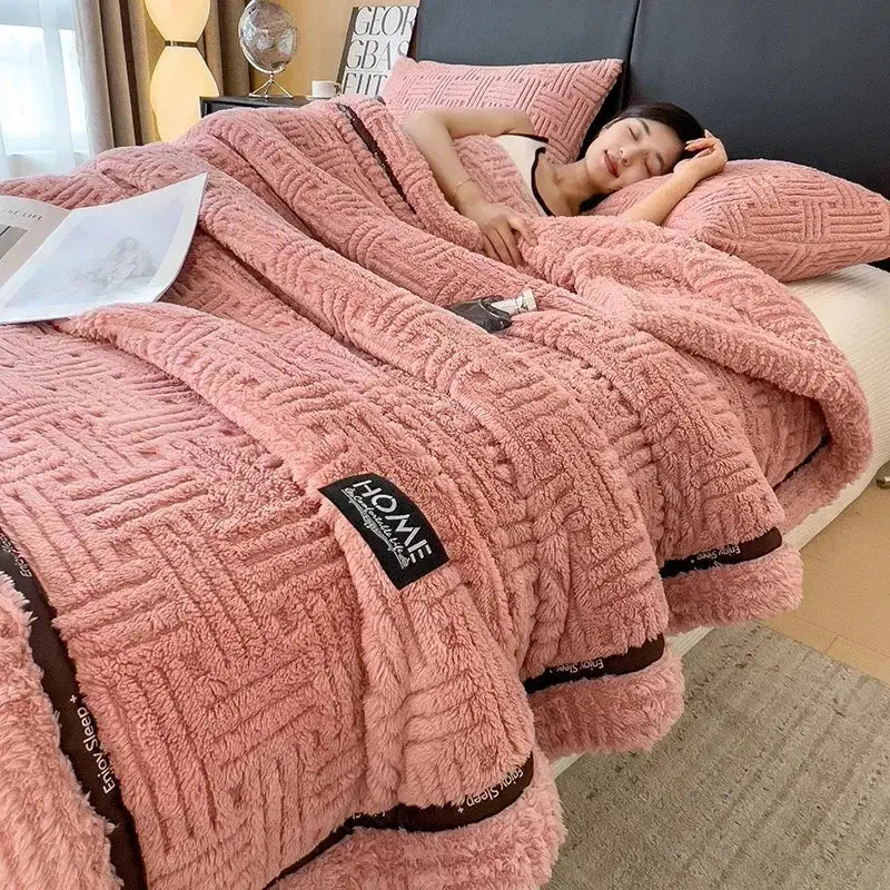 Pink plush cozy fluffy fleece blanket with textured geometric pattern and dark brown trim for decorbites cozy fluffy use