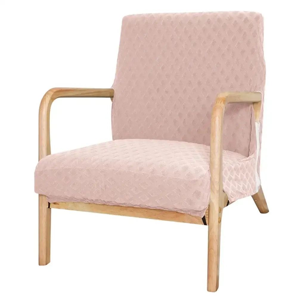 A soft pink upholstered armchair with textured fabric and light wood frame featuring decorbites jacquard elastic seat cover