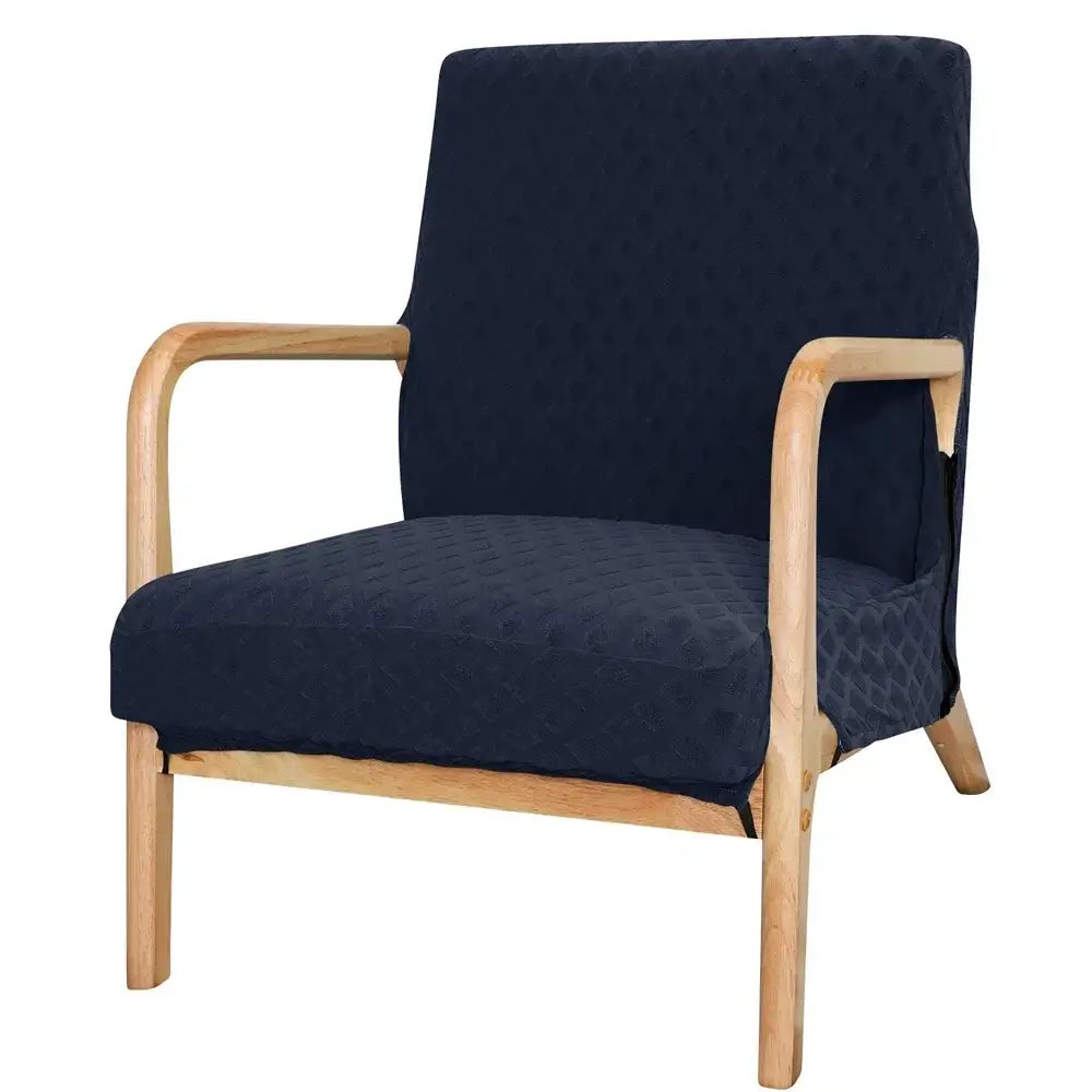 Navy blue quilted fabric armchair with light wood frame featuring beige textured jacquard elastic seat covers decorbites