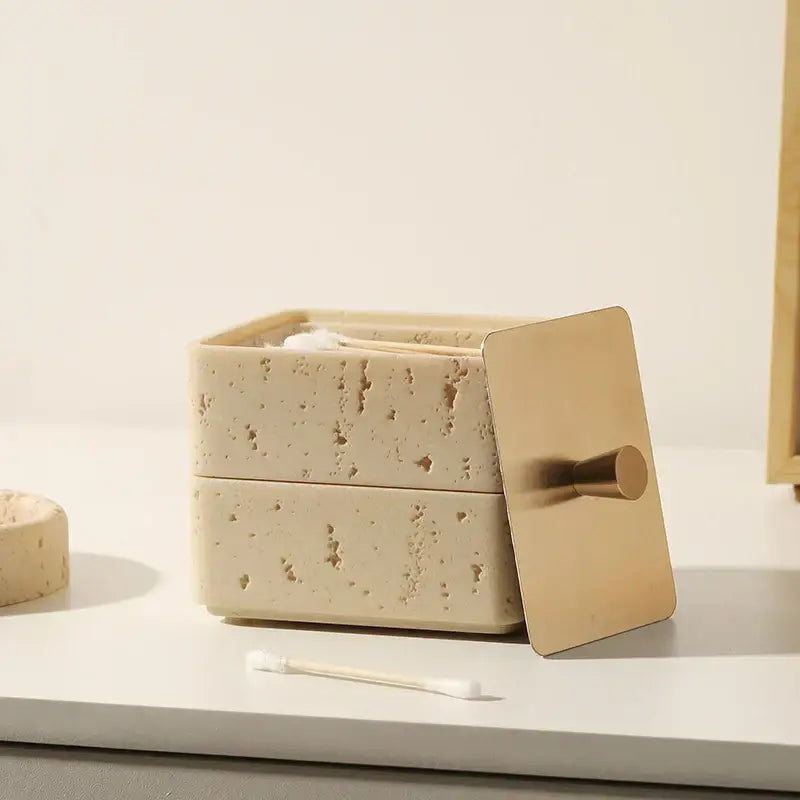 Beige textured natural stone double decker jewelry organizer with brushed gold lid and handle for bathroom use