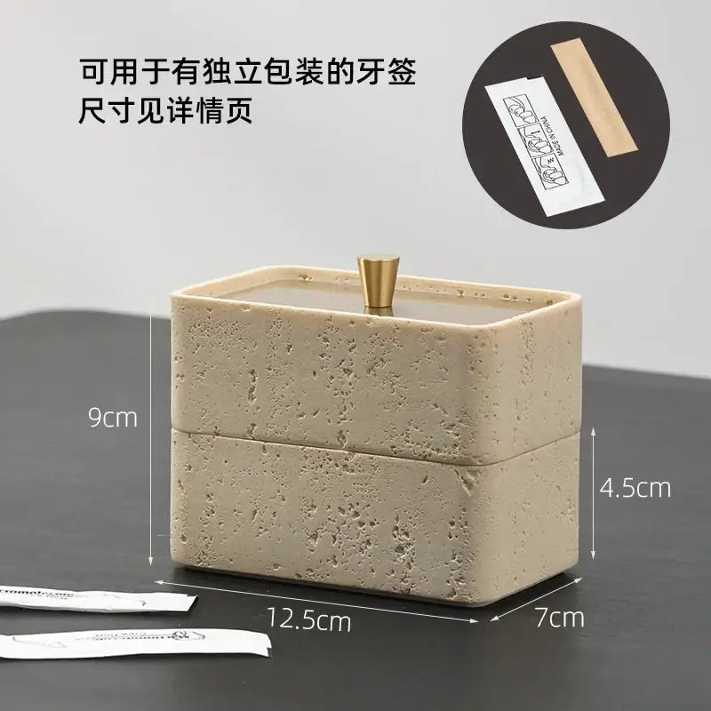 Beige textured natural stone double decker jewelry organizer with a gold-toned knob toothpick holder for bathroom use