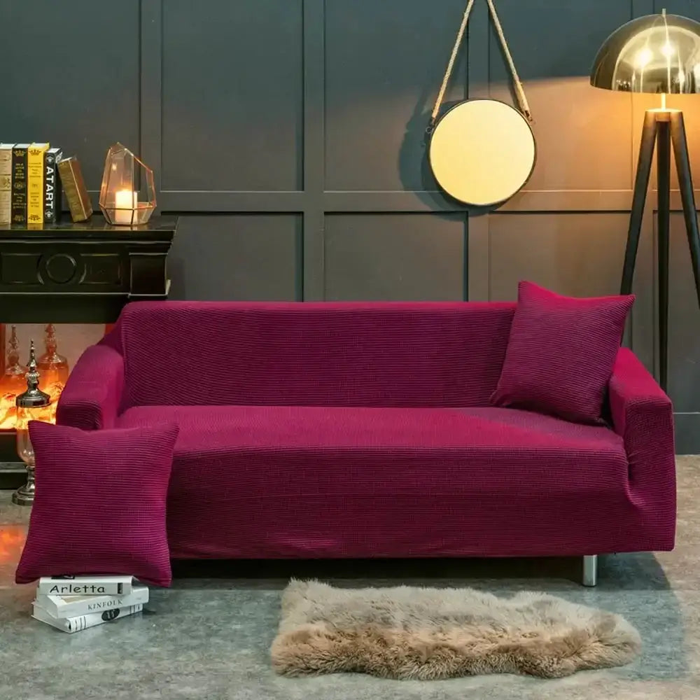 Fuchsia corduroy sofa cover with matching pillows complementing beige textured quilted sofa cover decorbites 3d quilted design