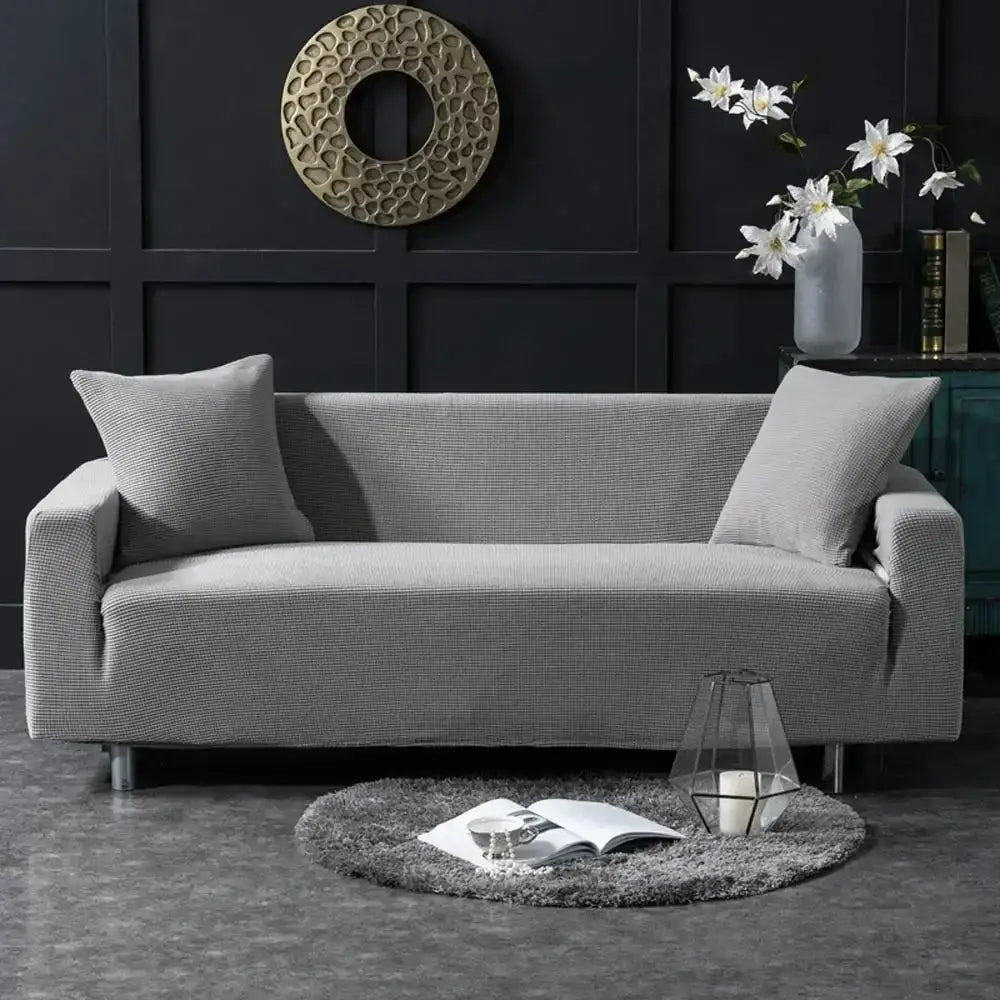 Gray textured quilted sofa cover with matching throw pillows for living room by decorbites 3d quilted sofa cover