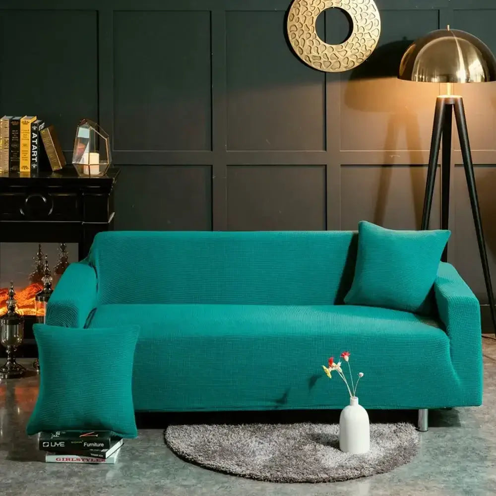 Teal corduroy sofa cover with matching throw pillows complementing beige textured quilted decorbites 3d sofa cover