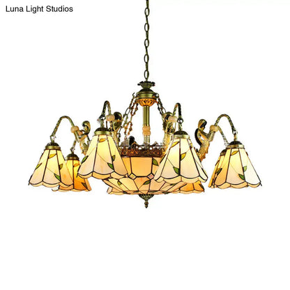 Antique brass-finished DecorBites™ chandelier with eight stained glass tiffany cut glass shades and conical hanging light design