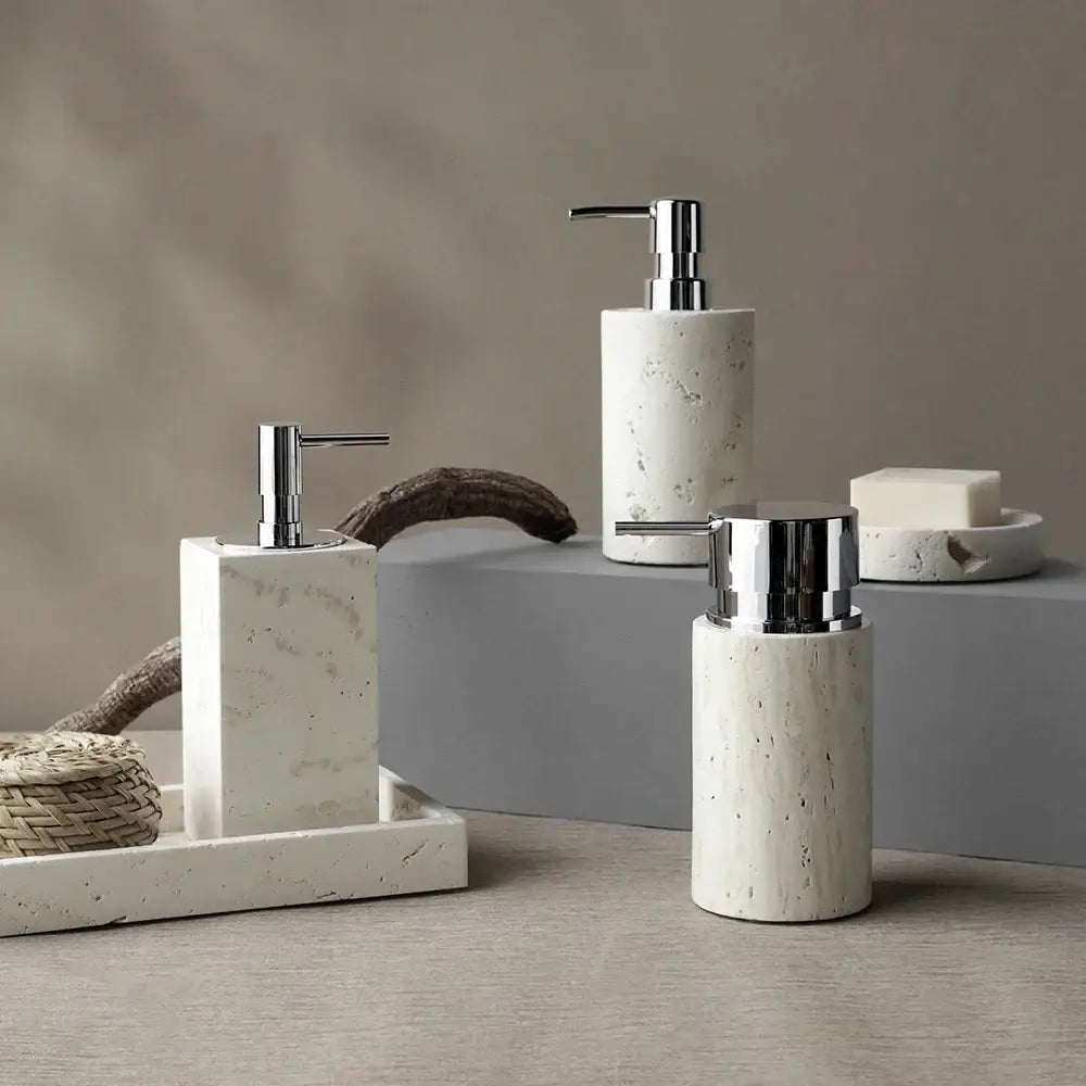 Beige travertine marble bathroom set with sleek chrome pump dispensers and matching soap dish for elegant decorbites decor