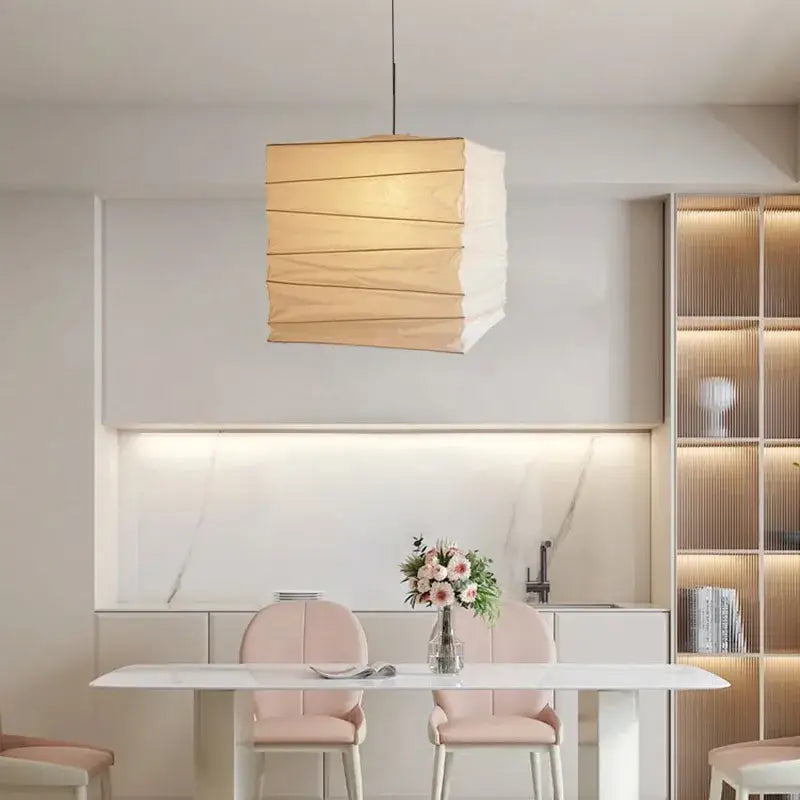 Beige and white decorbites cube rice paper pendant lamp with a warm beige pleated shade for living room decor