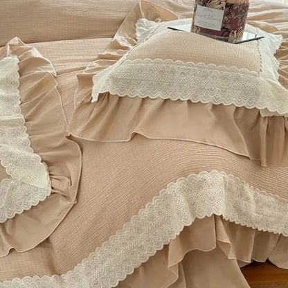Beige bedding set with delicate white lace ruffles featuring a bedroom duvet cover for elegant decor