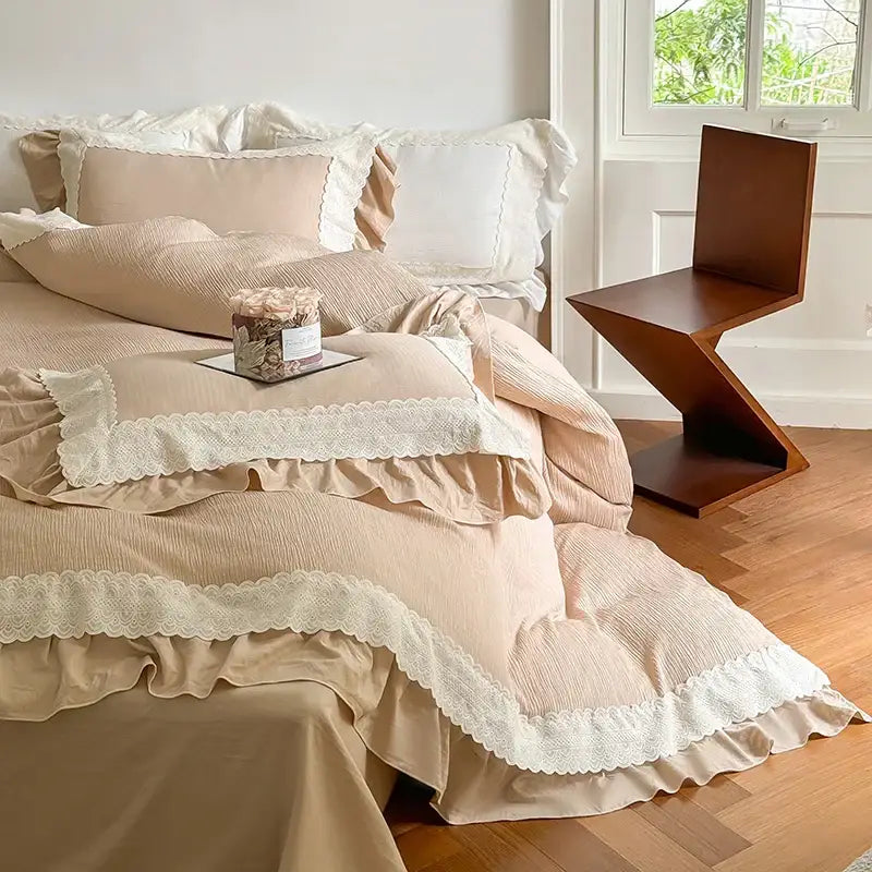 Beige bedding set with delicate white lace ruffles featuring a duvet cover for elegant bedroom decor