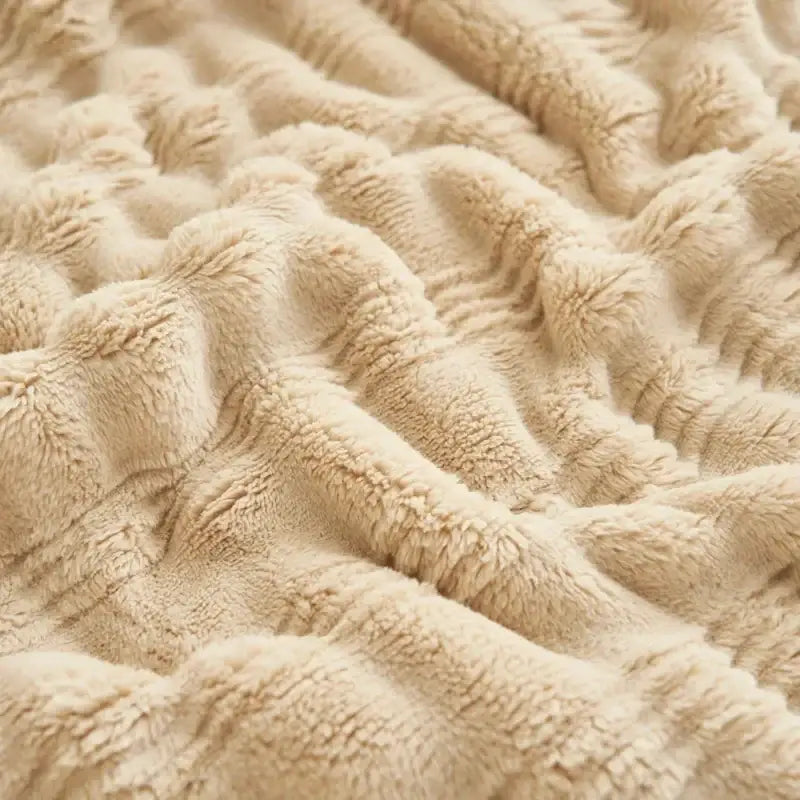 Beige and white striped rabbit plush blanket with soft textured plush surface and gentle wave-like ridges by decorbites cozy rabbit