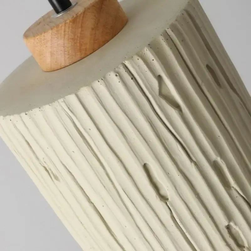 Beige wood grain columnar micro cement pendant light with cream ceramic lamp and natural wood base for decorbites columnar micro