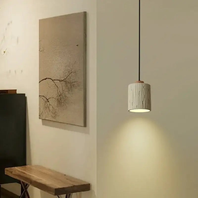 Beige wood grain columnar micro cement pendant light with white ribbed ceramic shade and wooden top for kitchen decor