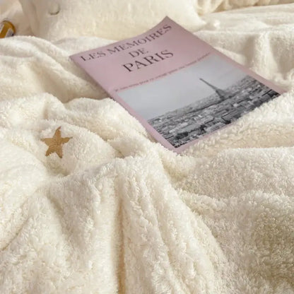 A cream white bedding set featuring a soft berber fleece star embroidery from decorbites berber fleece collection