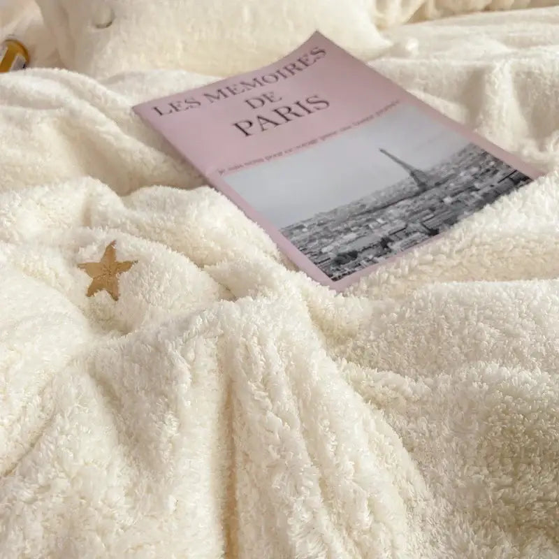 A cream white bedding set featuring a soft berber fleece star embroidery from decorbites berber fleece collection