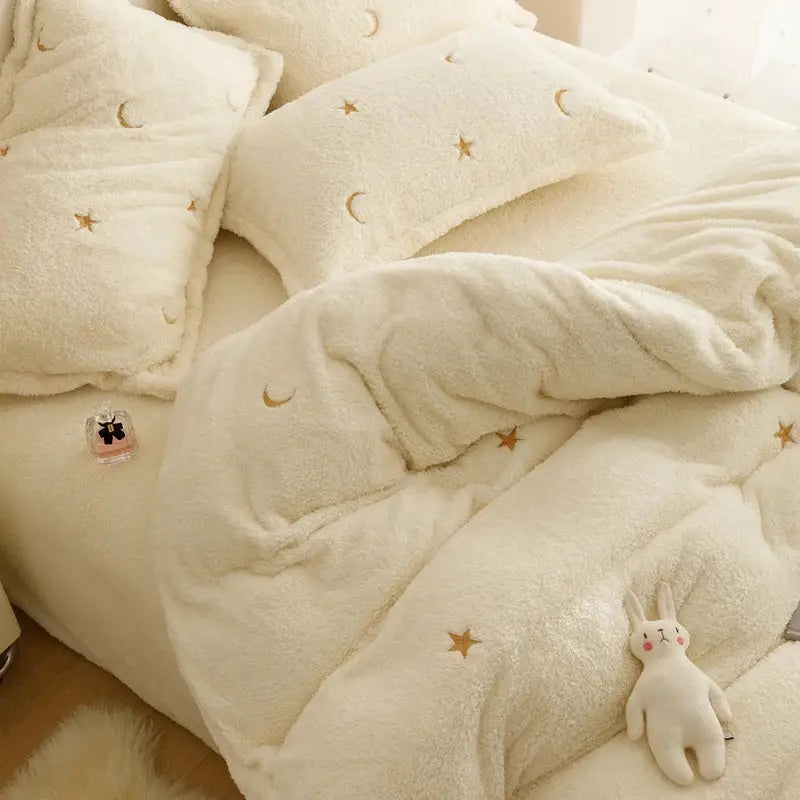 Cream-colored plush berber fleece star embroidery bedding set with gold stars and moons by decorbites for white bedrooms