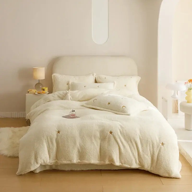 Cream-colored plush Berber fleece star bedding set with embroidered gold stars and moons for cozy decorbites bedroom