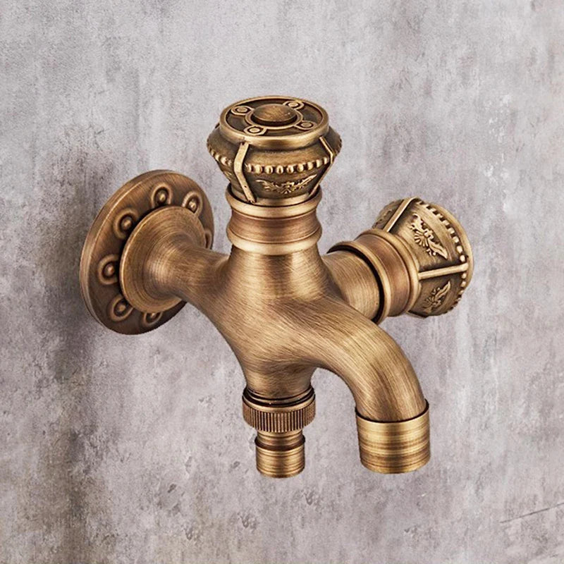 Antique bronze wall mounted bibcock with ornate floral and beaded detailing for garden outdoor and kitchen use
