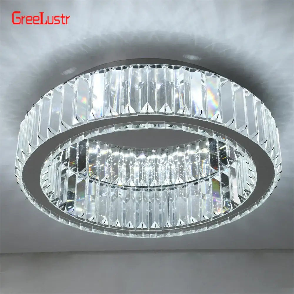 A modern silver metal big crystal round led dimmable chandelier with two rings of clear faceted crystals for living room decorbites