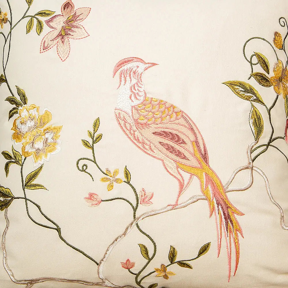 Cream-colored bird embroidered cotton cushion cover with pink and gold bird floral motifs for living room decorbites decor