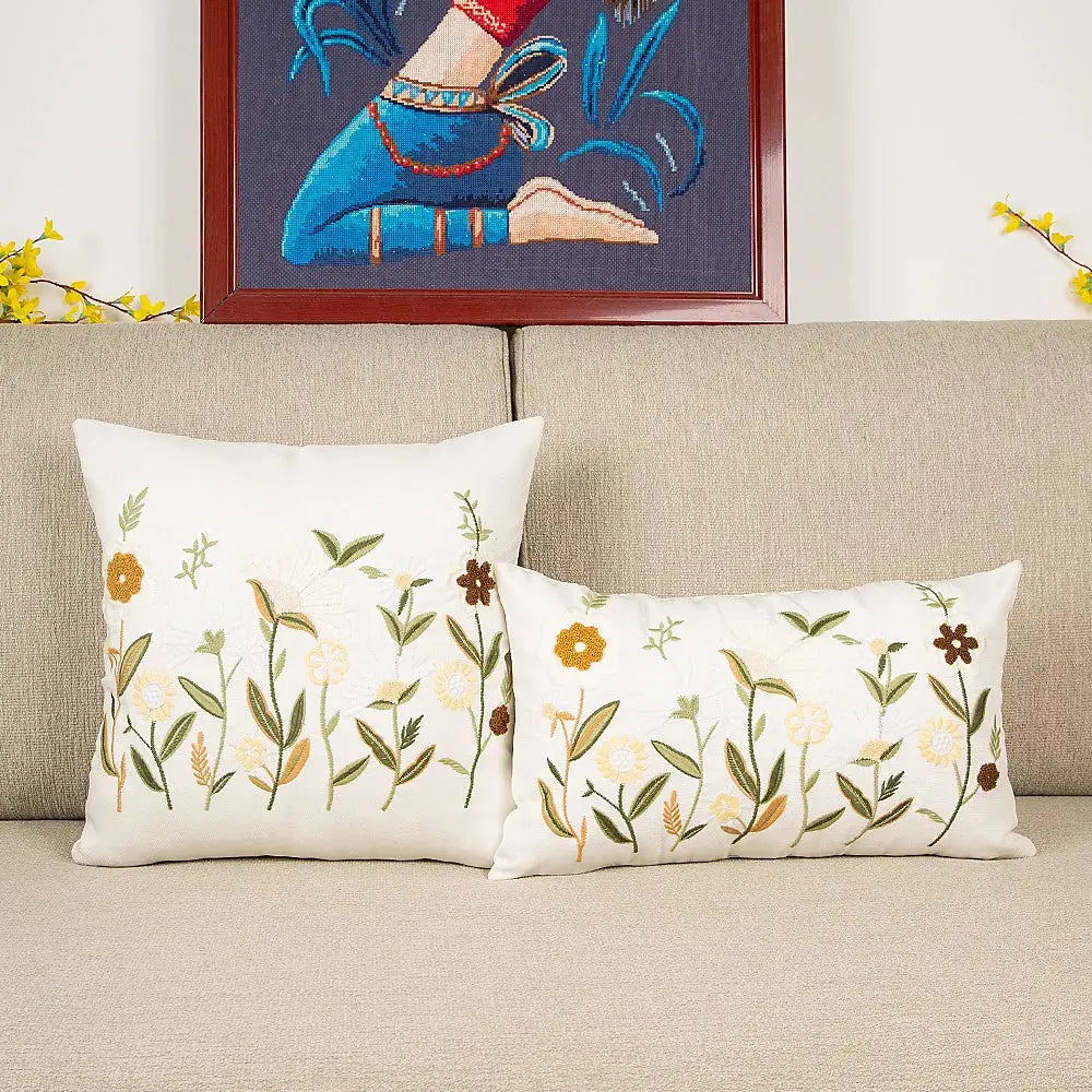 Two bird embroidered cotton cushion covers with yellow brown green floral pattern on soft white fabric for decorbites decor