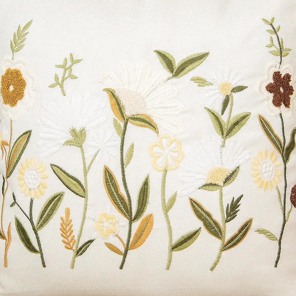 Delicate bird embroidered cotton cushion cover with white yellow brown flowers and green leaves on off-white fabric