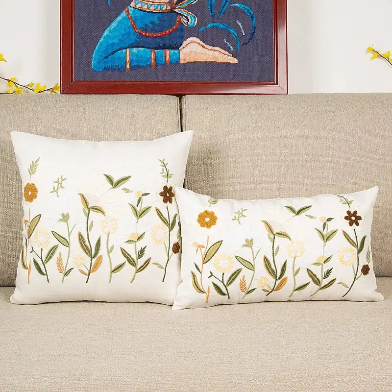 White rectangular bird embroidered cotton cushion cover with green yellow and brown floral pattern for living room decorbites