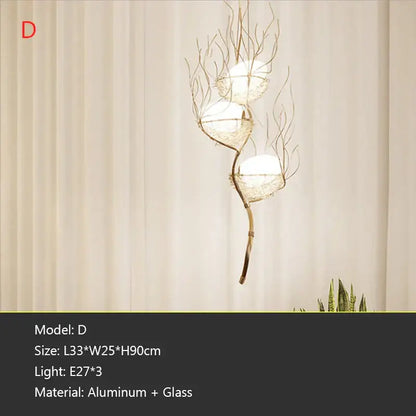 Elegant gold-toned bird nest led pendant light with three glass shades crafted from aluminum and glass for dining room decor