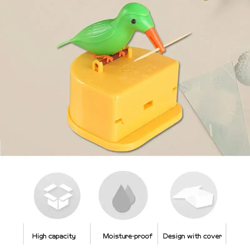 Green plastic birdie toothpick holder with orange beak and feet on yellow base for kitchen storage decorbites birdie toothpick