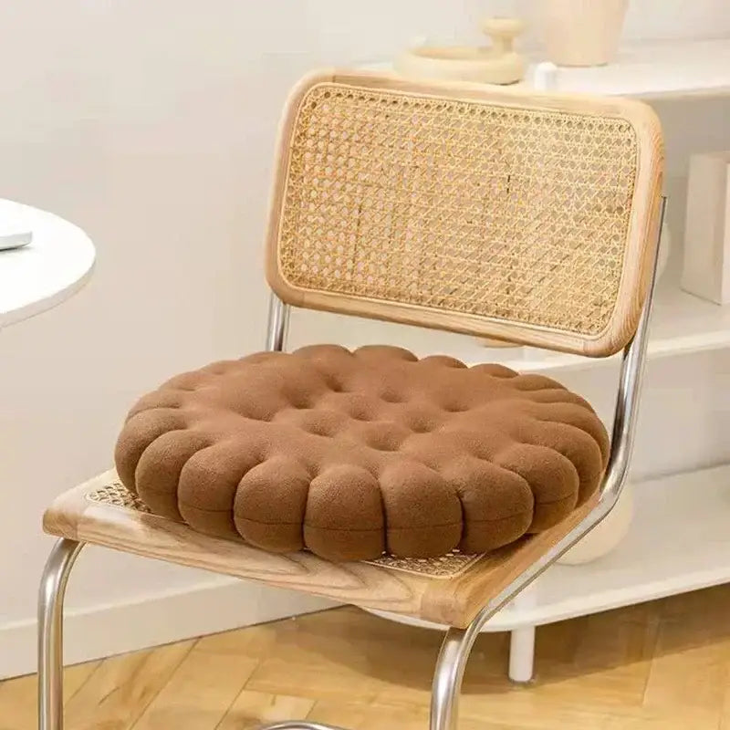 Brown tufted biscuit sofa cushion with plush texture on wooden cane-backed chair enhances living room decorbites biscuit decor