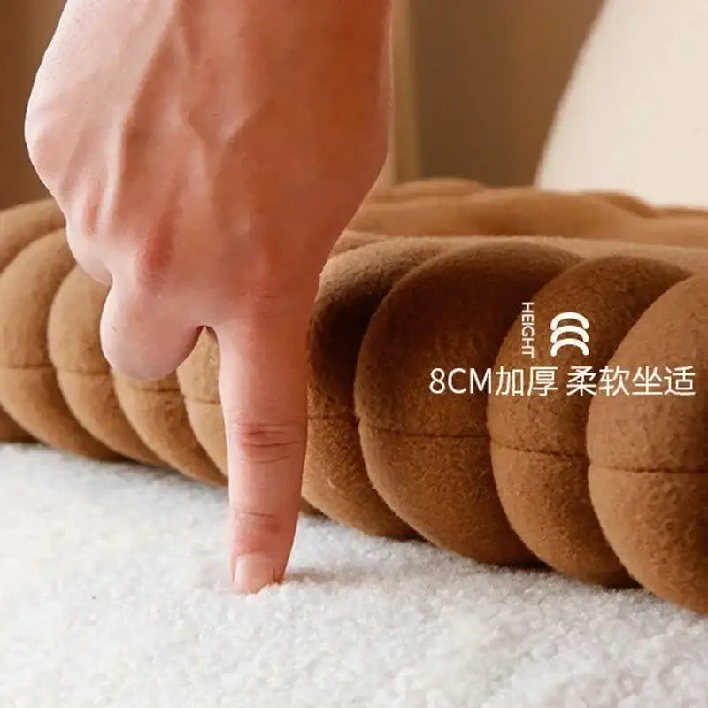 Brown plush segmented decorbites biscuit sofa cushion with soft cushioned texture for living room decor